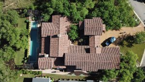 A bird 's eye view of a house with a pool.